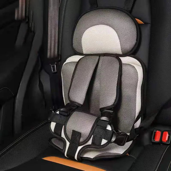 🥳2026 HOT SALE🥳💞50K+ SOLD!🧳👶Portable Child Protection Car Seat – Lightweight 0.4kg, foldable & breathable mesh. 5‑point safety harness for 0‑12 years – stress‑free travel! 🚗✨