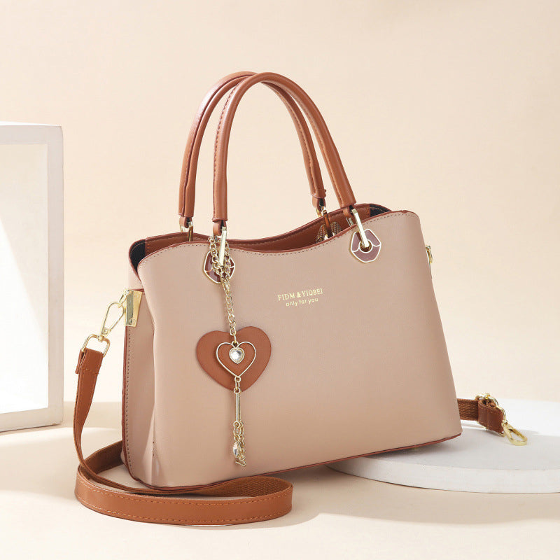 👜 LIMITED-TIME 50% OFF! ✨Elegant Heart Charm Tote Bag | Soft Faux Leather Crossbody with Adjustable Strap | Spacious Women's Shoulder Handbag💖